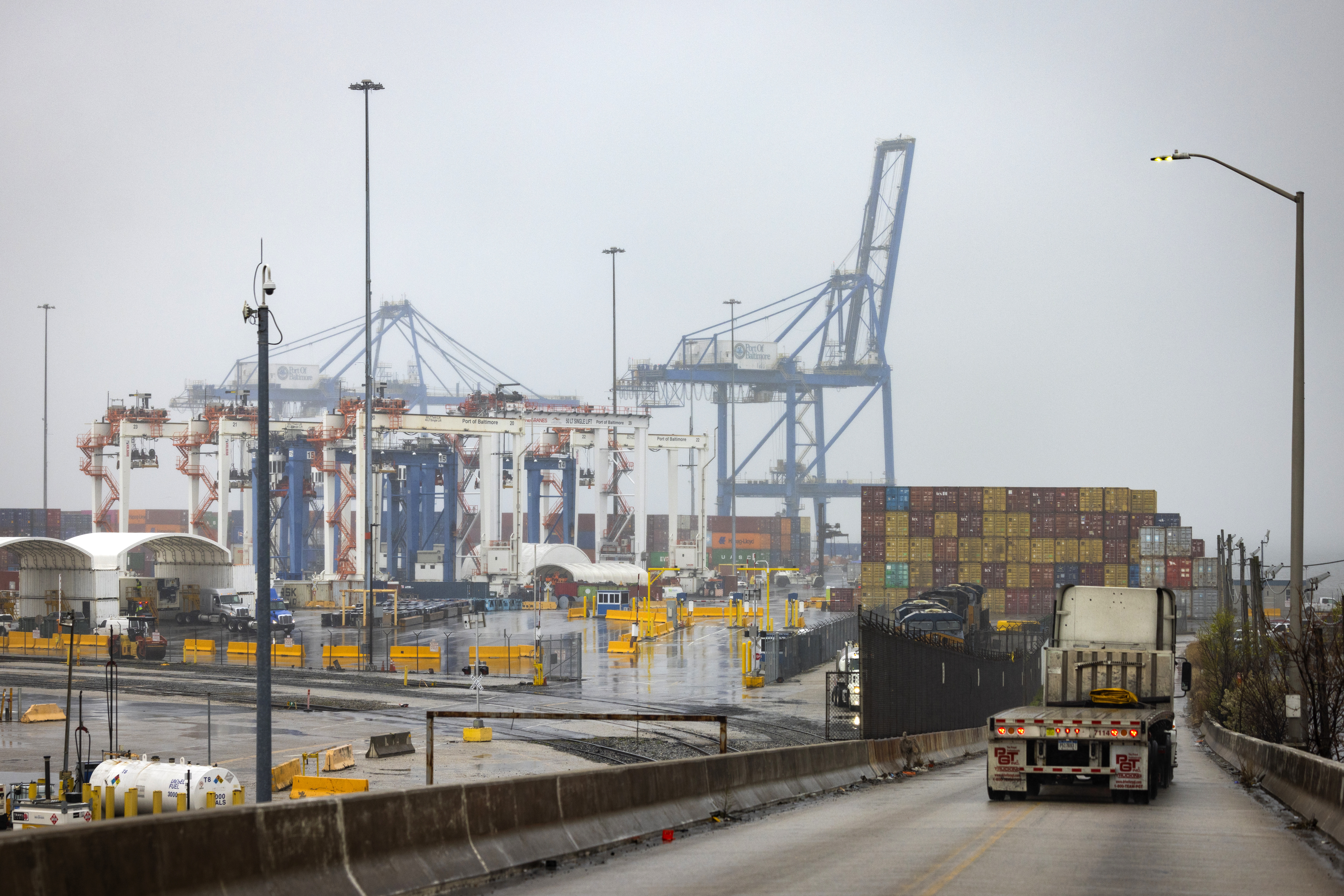 Divers found two bodies under a collapsed bridge in Baltimore