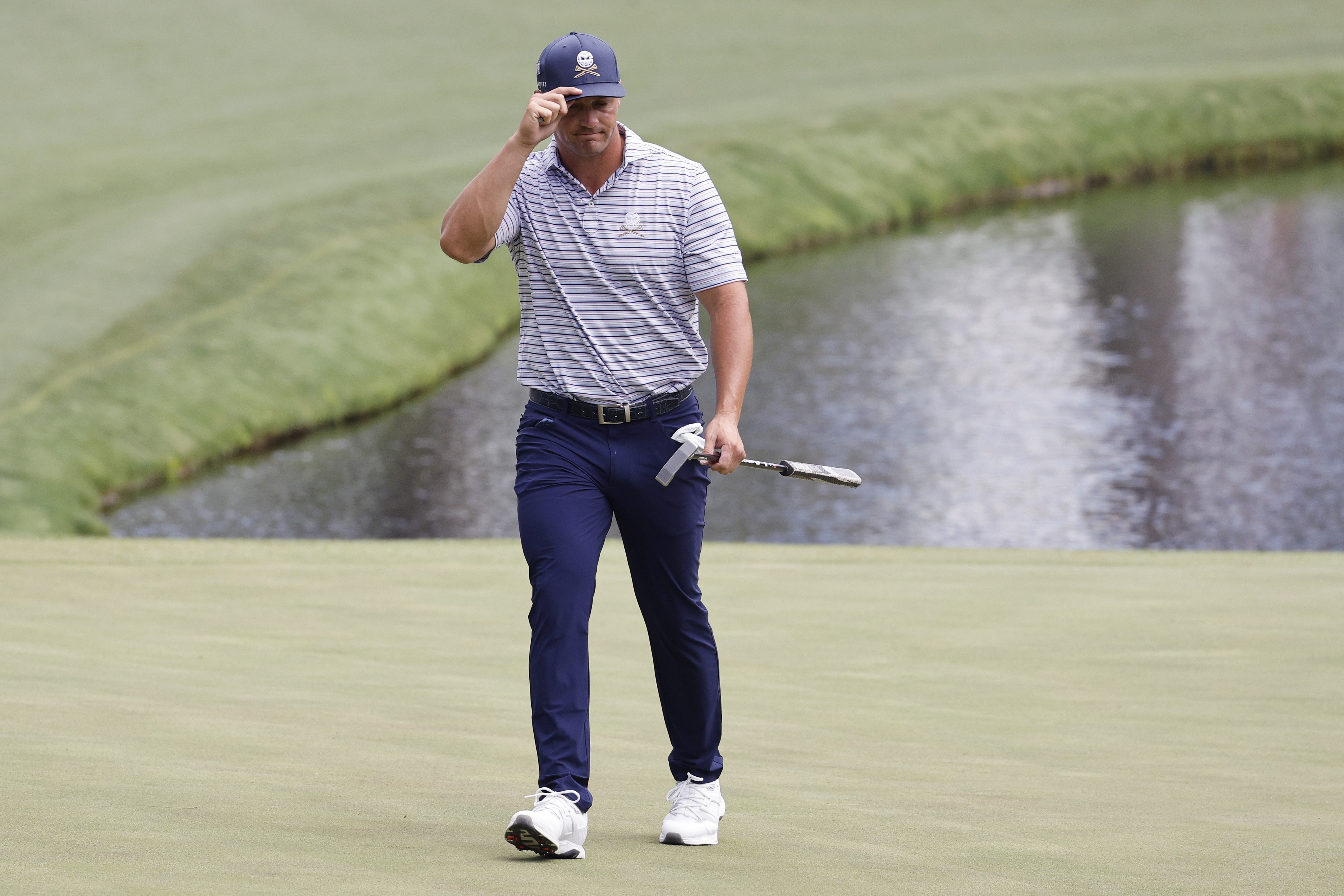 DeChambeau leads Scheffler by one stroke after opening day at the Masters