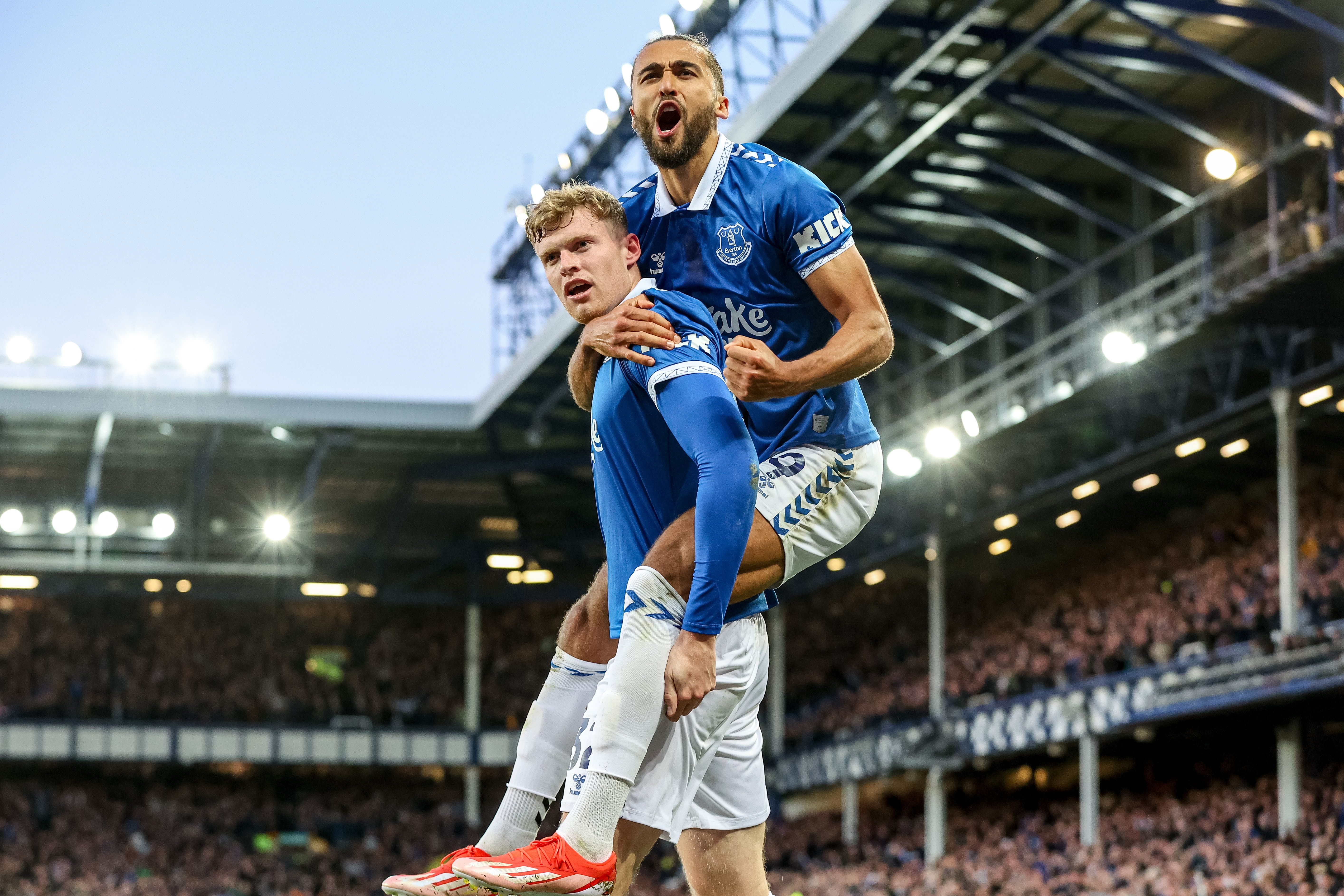 Everton dent Liverpool's title hopes with derby win