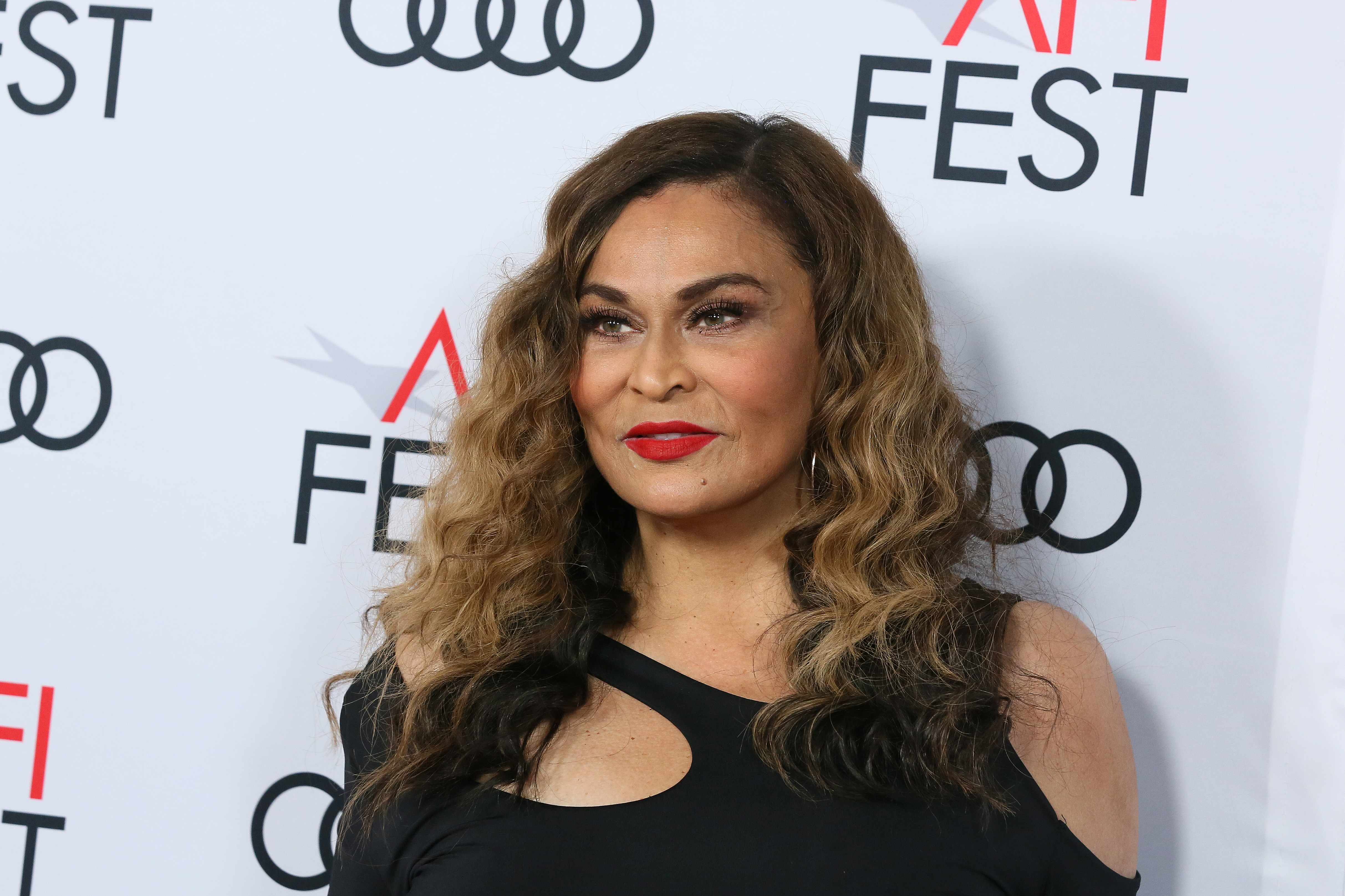 Ms. Tina Knowles Wears Diesel