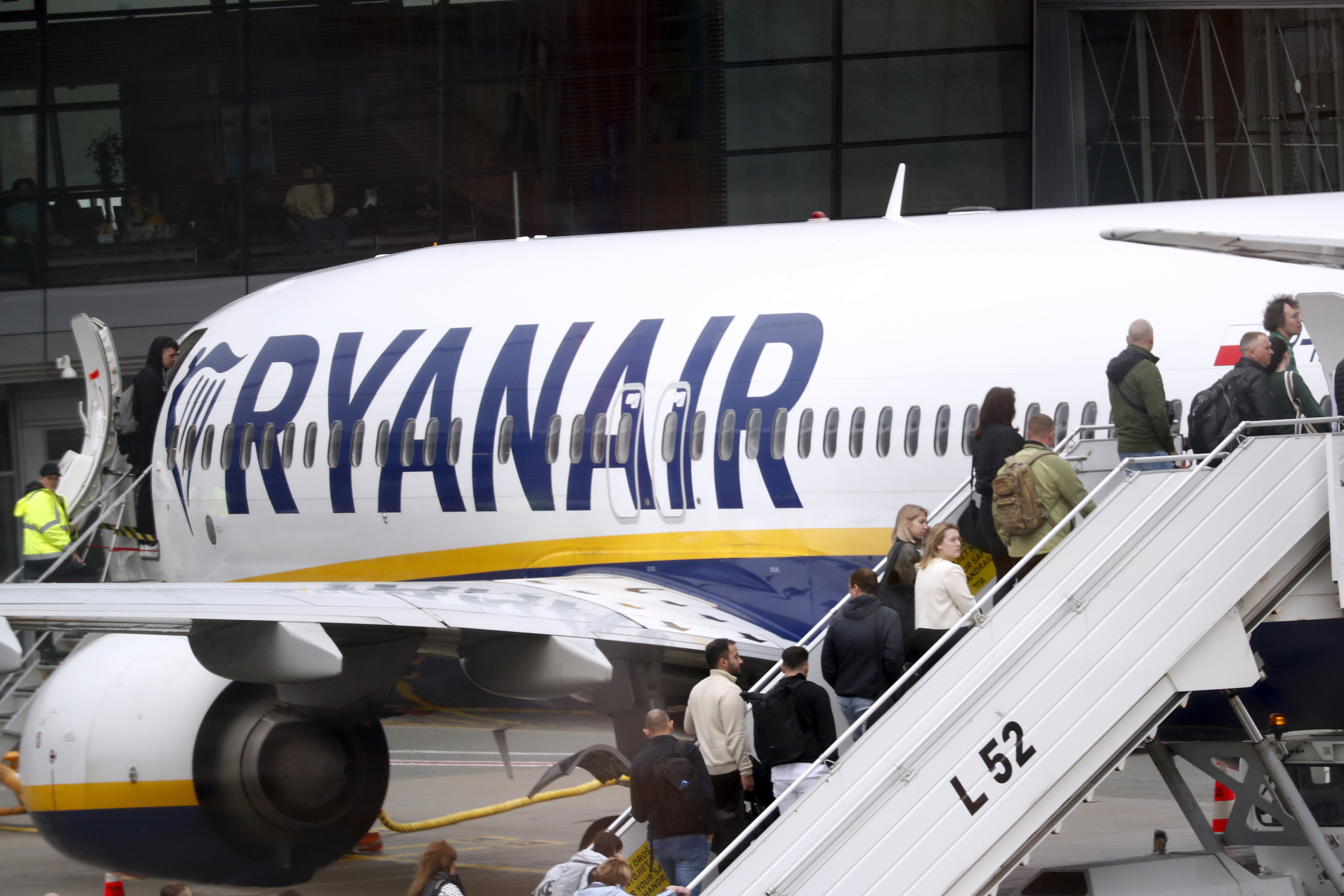 Ryanair's profit halved in the first quarter