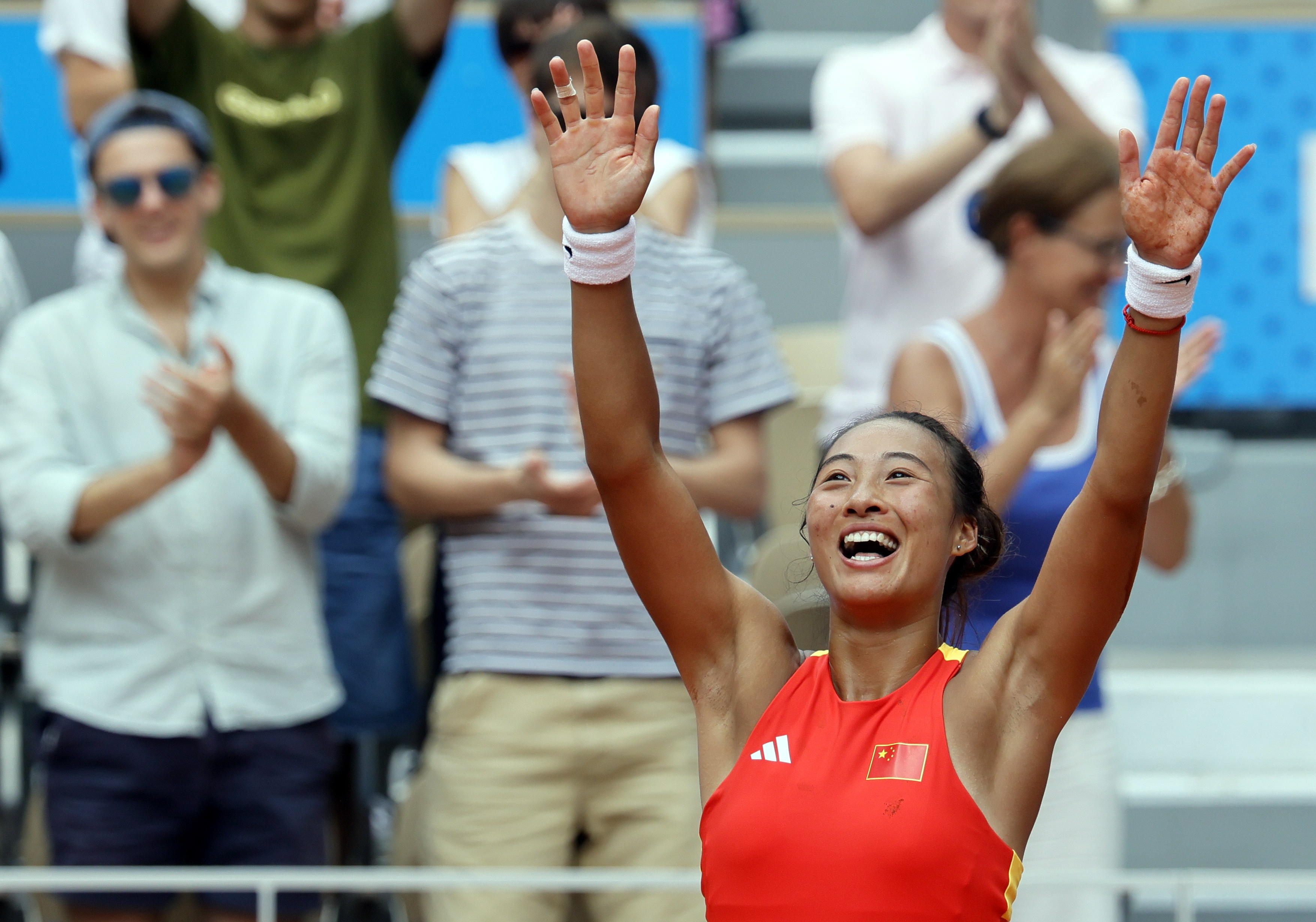 Qinwen Zheng stops world number 1 Swiatek to secure a place in Olympics final