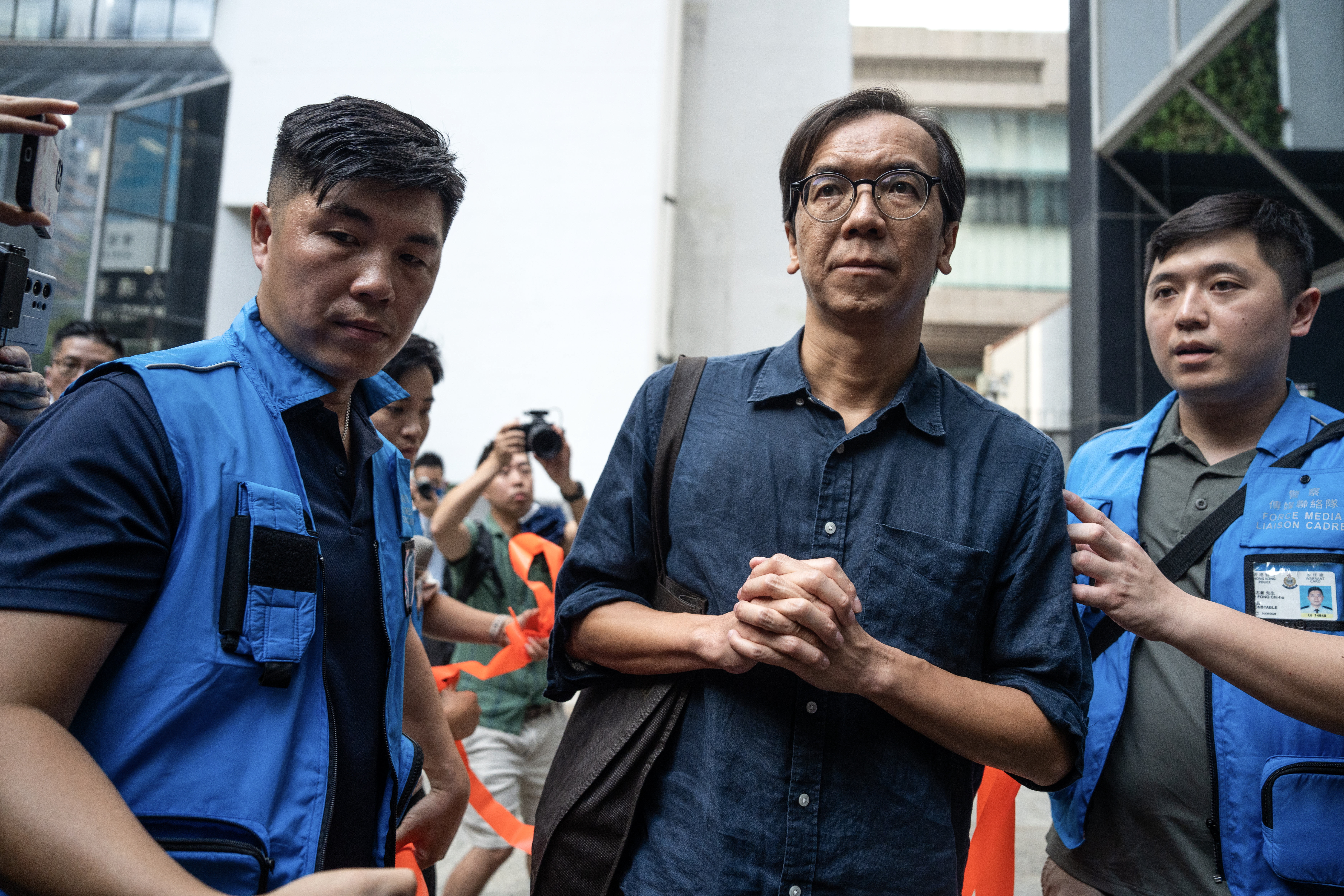 Hong Kong journalist sentenced to 21 months in prison