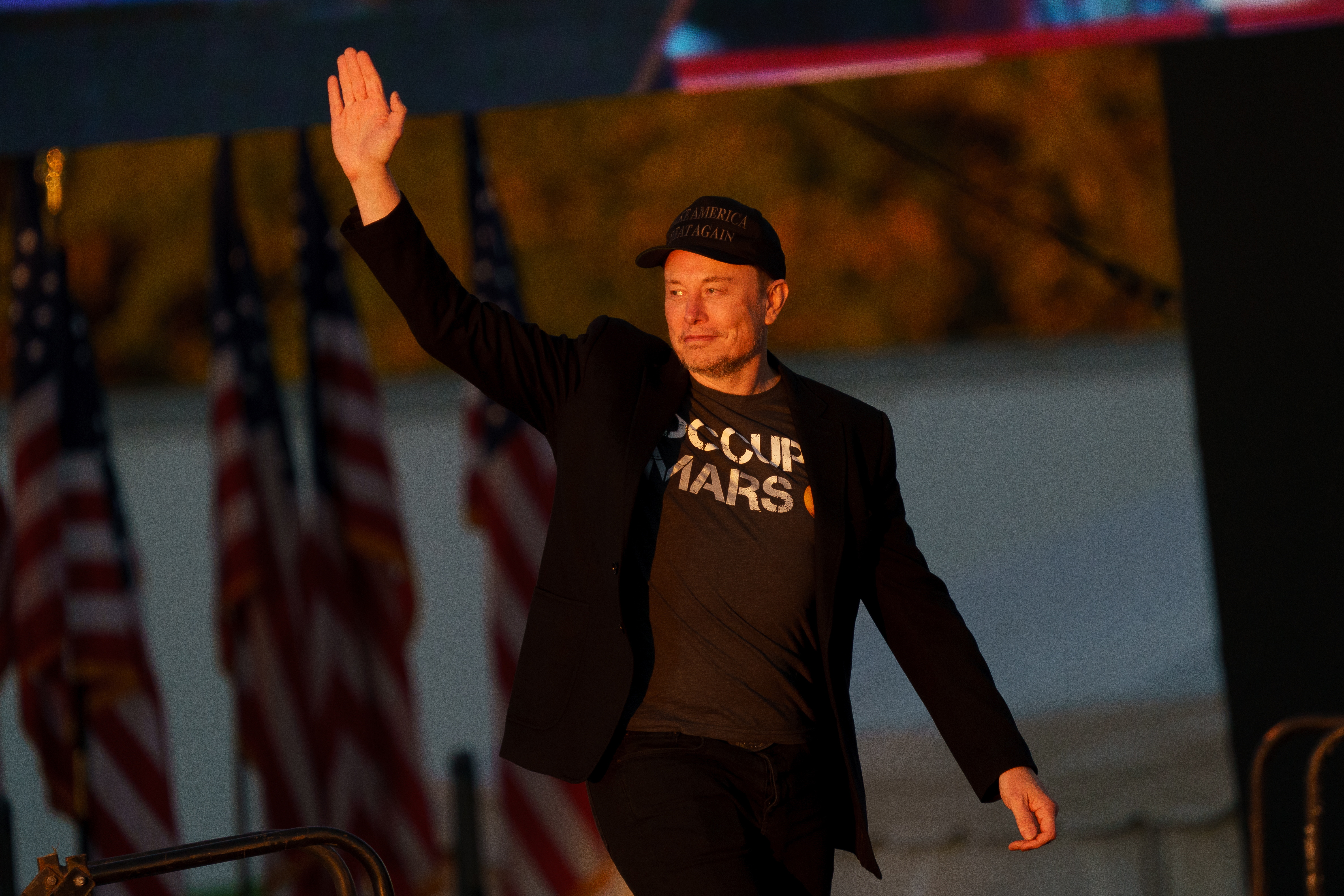 Trump and Musk side by side at a campaign rally in Pennsylvania