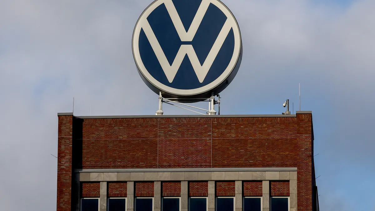 Volkswagen workers agree to lower wages to save 3 plants from closure