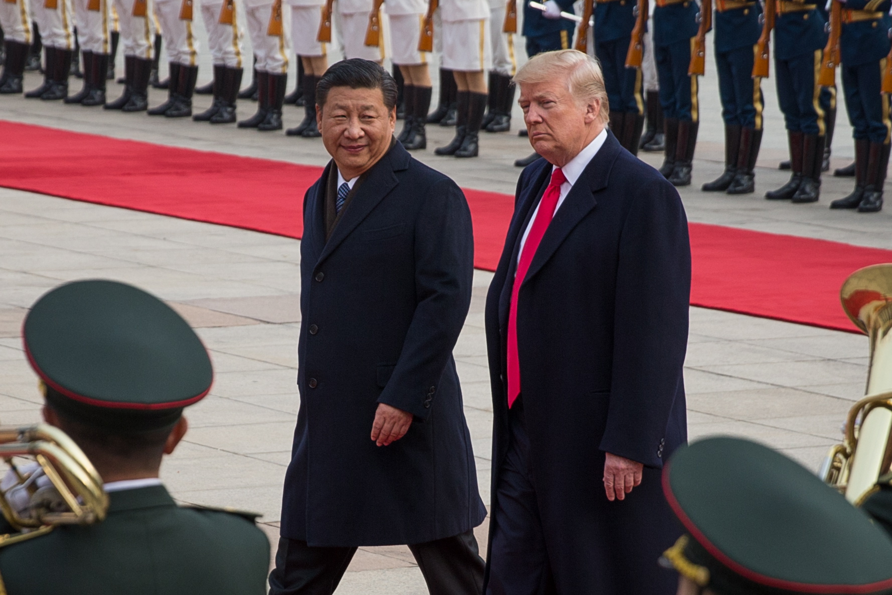 Trump and Xi vow to improve US-China ties in phone call