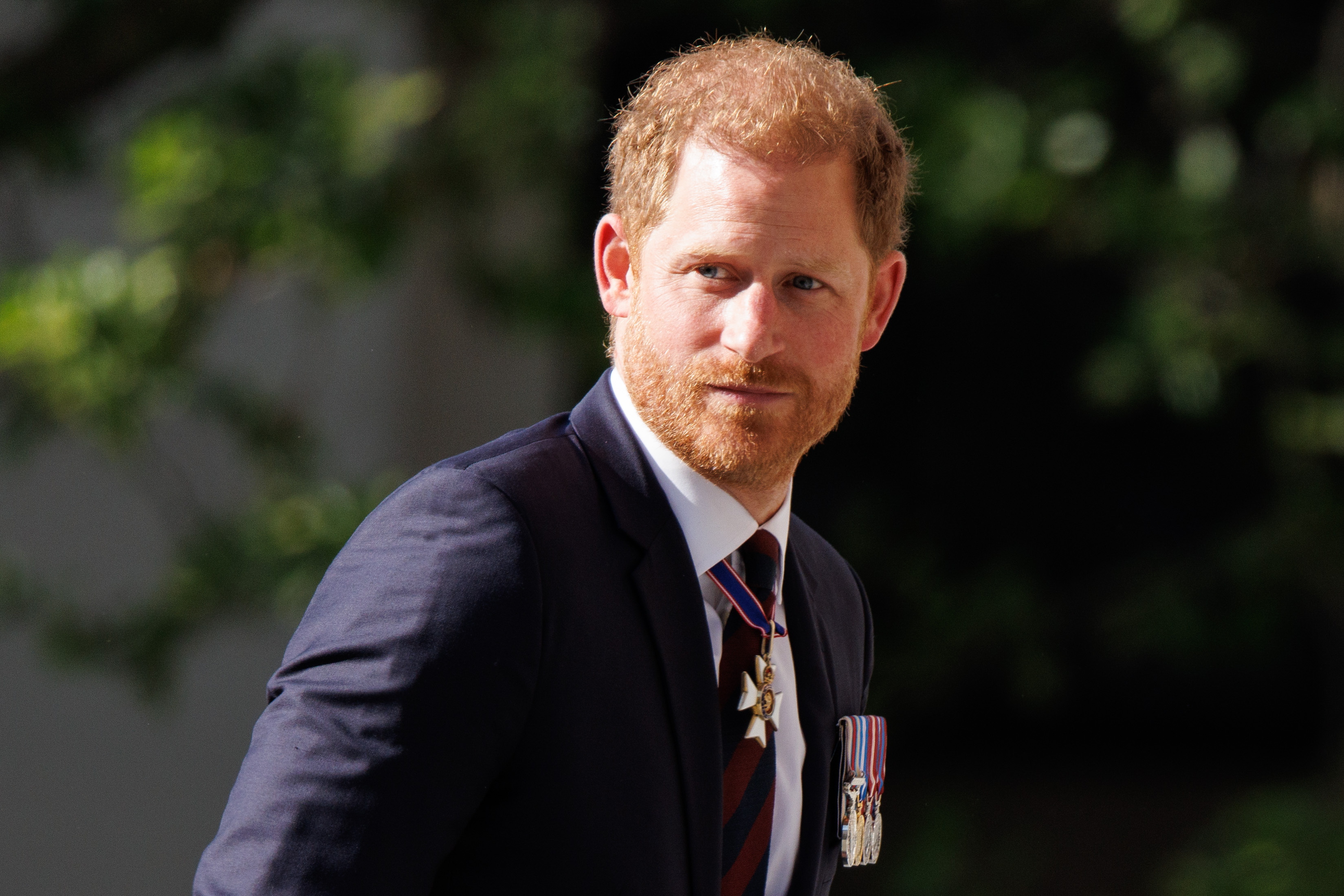 Prince Harry wins compensation and an apology from the owner of tabloid The Sun