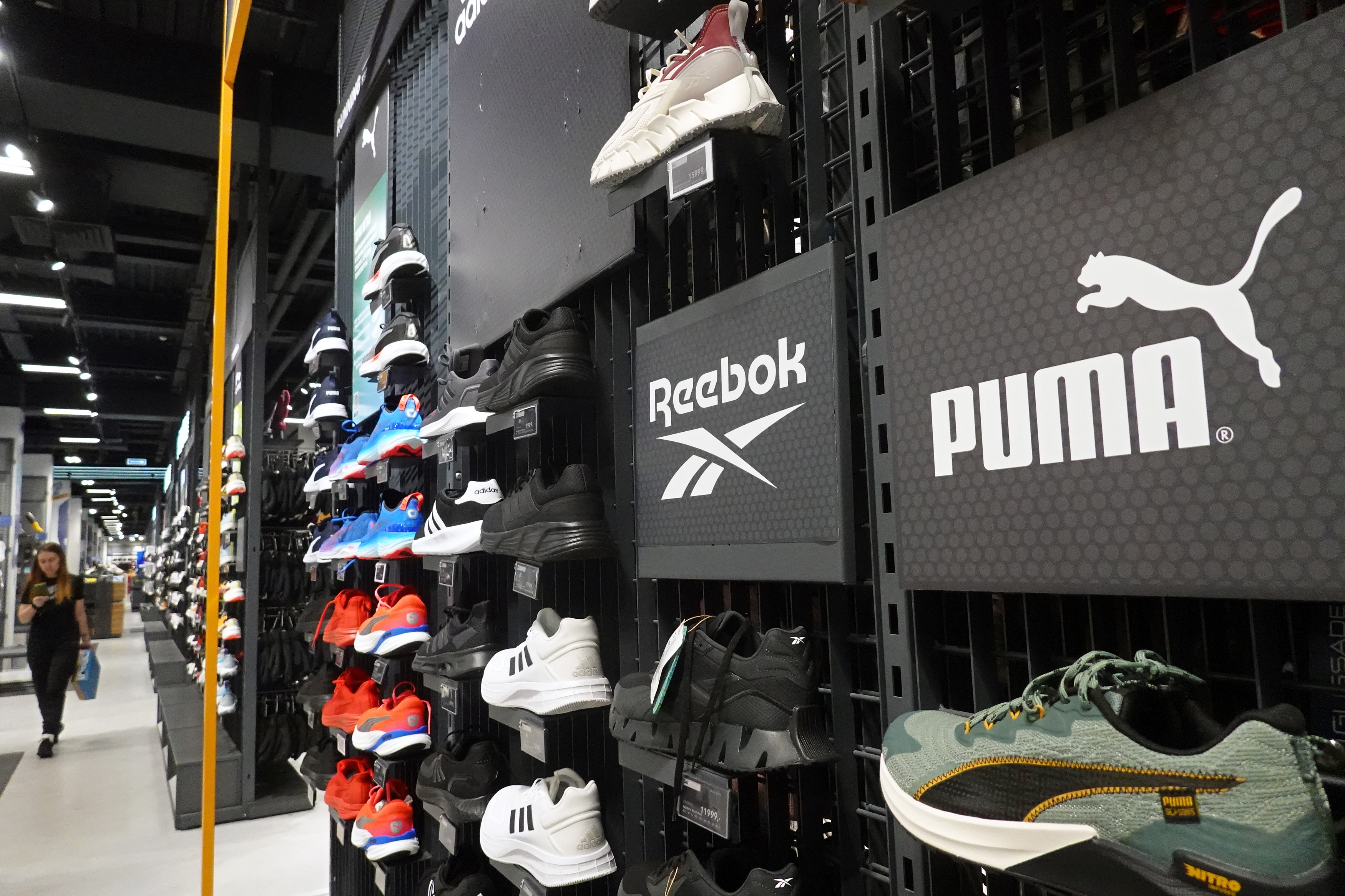 Adidas and Puma consider job cuts