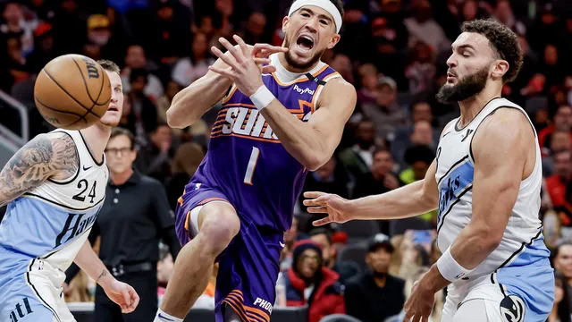 Booker dazzles with 47 points in Phoenix' OT win over Utah