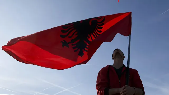 A huge Albanian flag waves over Skopje